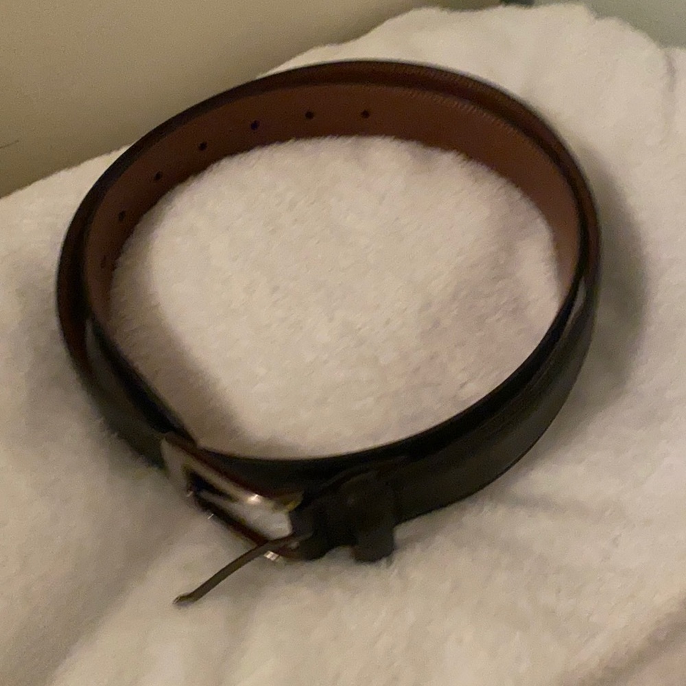 Men’s black leather belt with tags